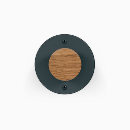 Runda Coat Rack 1 round black metal wall hook with a wood center for minimalist entryway organization