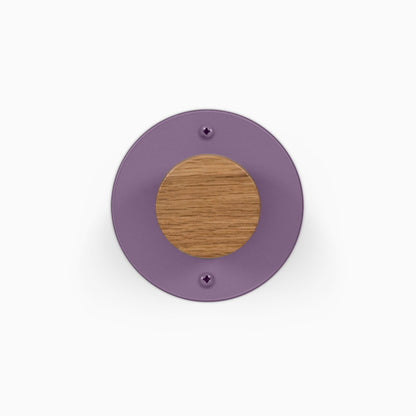 Runda Coat Rack 1 round purple wall hook with a natural wood center and two visible mounting screws