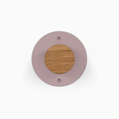 Runda Coat Rack 1 round mauve wall hook with a solid wood center and two visible mounting screws