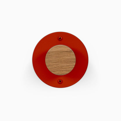 Runda Coat Rack 1 red circular wall hook with a solid hardwood center for organized entryway storage