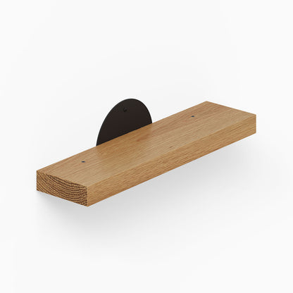 Shortie Deux Wall Shelf made of solid hardwood with a black metal bracket, a minimalist floating shelf perfect for modern wall display and organization.