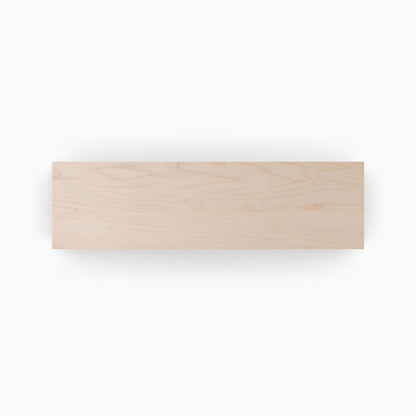 Unfinished Maple Wood Slab with smooth, natural grain, ideal for custom floating shelves and wall display projects.