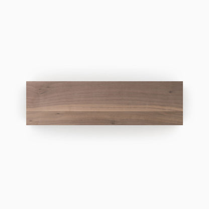 Unfinished Walnut Wood Slab in natural wood tones, perfect for custom floating shelves or wall display projects.