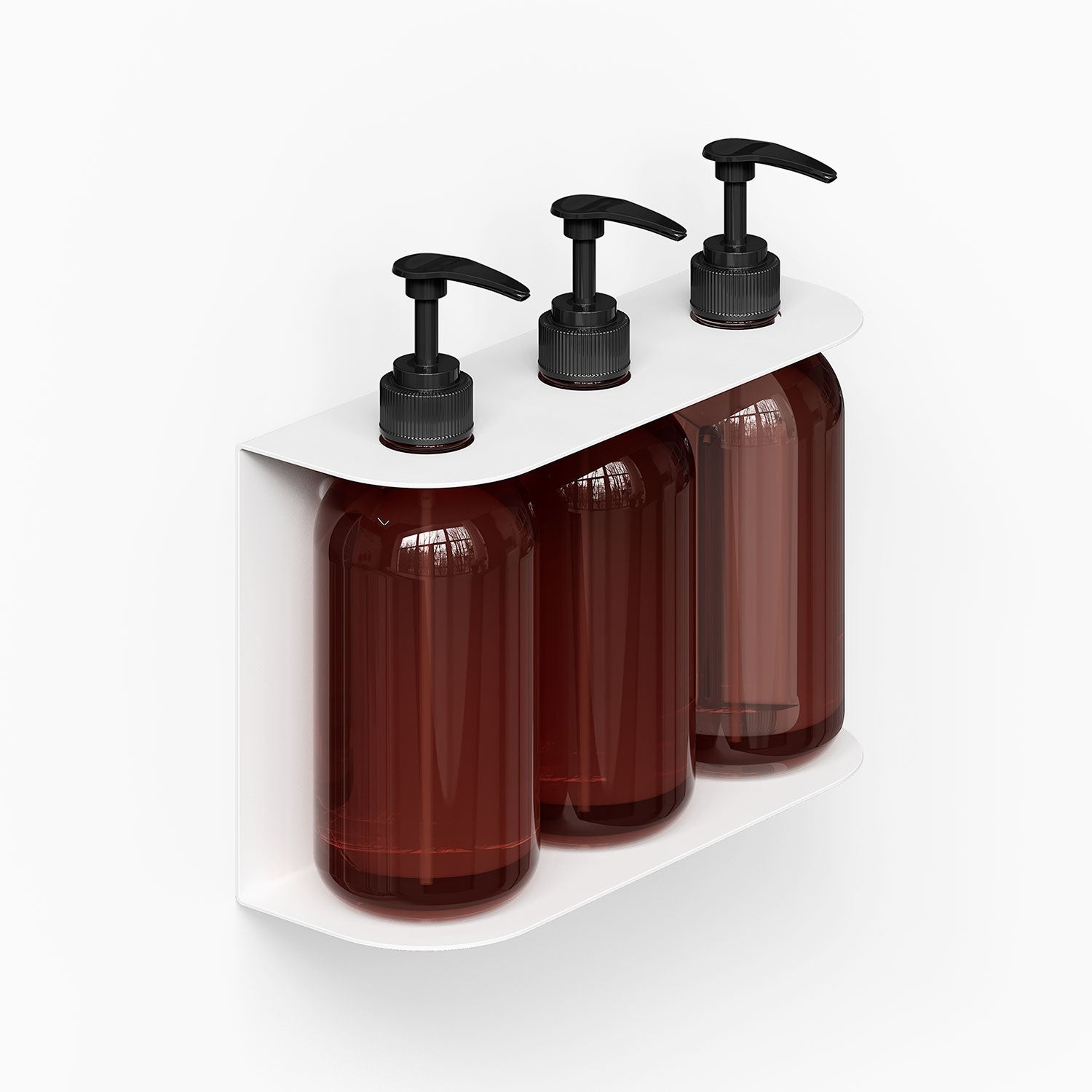 Soap Opera Shower Dispenser features a minimalist white metal wall mount holding three amber pump bottles with black tops for organized shower storage.
