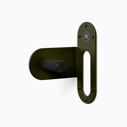 Spoke Bike Hanger – forest color, left orientation. Modern wall or ceiling-mounted bike hanger by Shelfology, USA-made powder coated steel.
