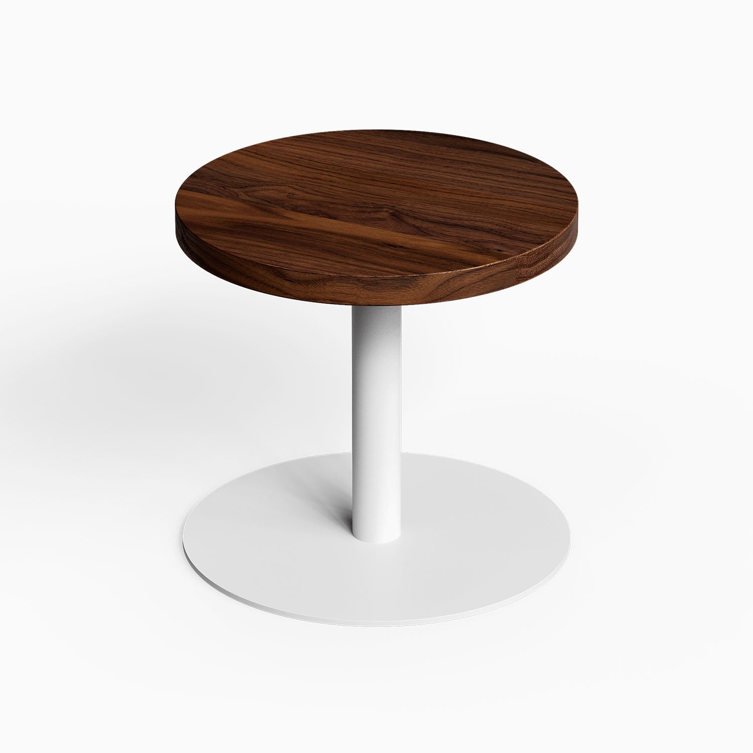 Spot On Side Table with round dark wood tabletop white pedestal base and circular foot on a clean background