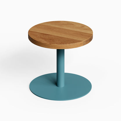 Spot On Side Table with a round solid hardwood top and teal metal pedestal base for functional modern display and organization