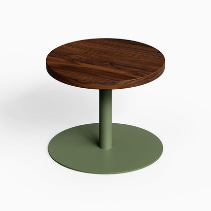 Spot On Side Table featuring a round walnut wood top and matte olive green steel base, minimalist and functional design for versatile spaces.