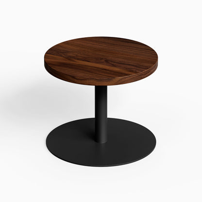 Spot On Side Table featuring a round walnut wood top and matte black steel base, minimalist modern design perfect for organized living spaces.