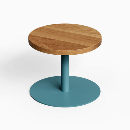 Spot On Side Table with a solid hardwood round top and matte blue steel base, minimalist design perfect for modern spaces.