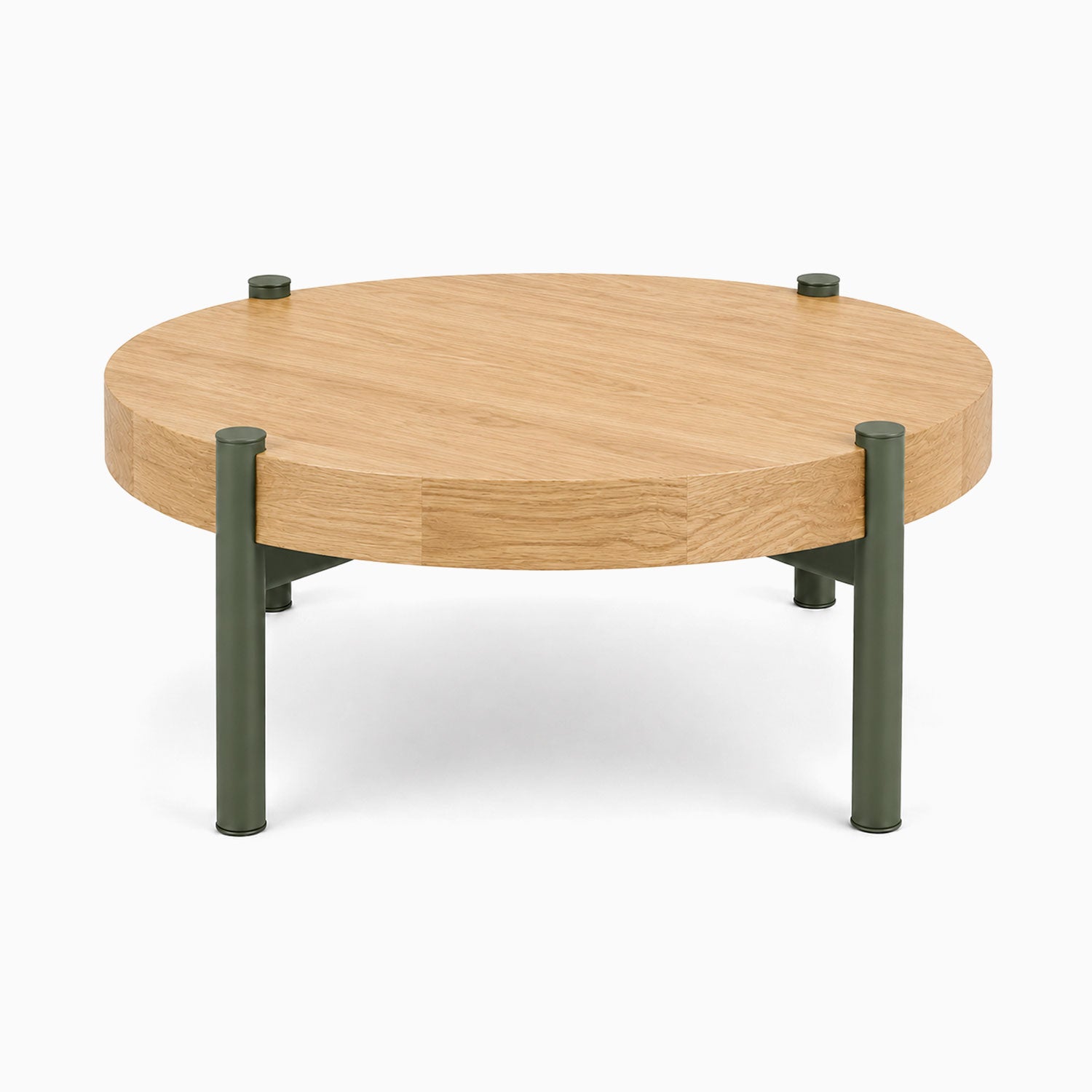 Stay Coffee Table with a round solid hardwood top and durable army green steel legs, combining minimalist design and functional style.
