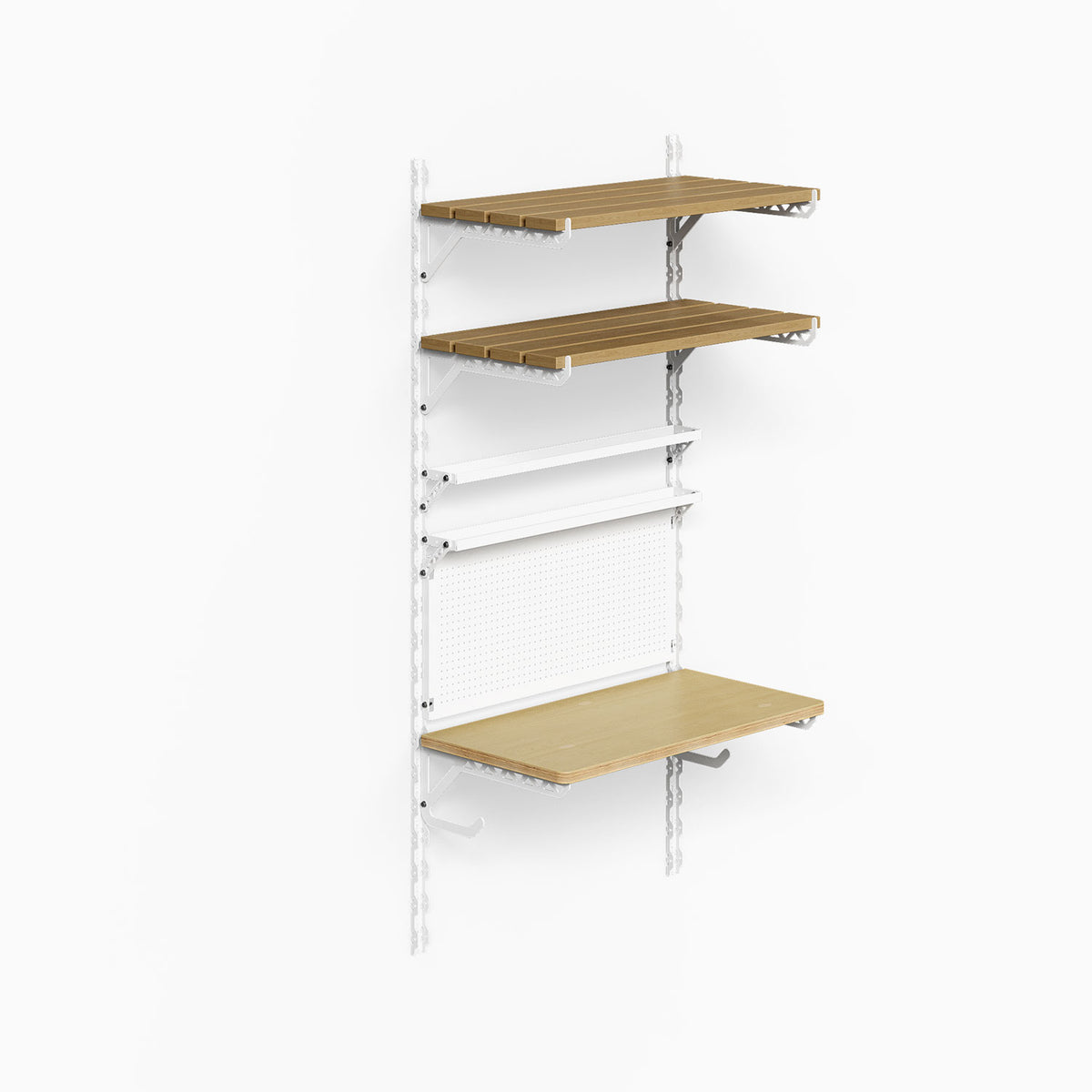 Studly Wall Storage Workbench & Tray system with mixed wood and steel shelves and pegboard for versatile wall organization in minimalist design.