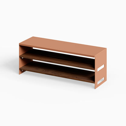 Take Five Bench + Shoe Rack with a minimalist design featuring clay-colored steel frame and walnut wood shelves, combining durability and style for organized entryways.
