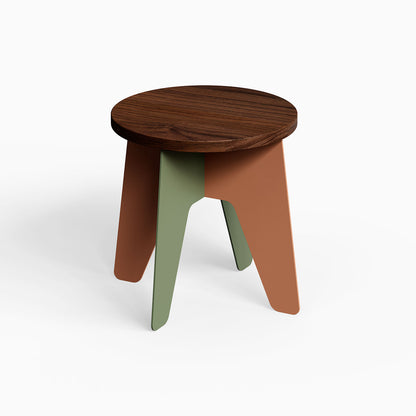 Time Out Kids Stool with solid hardwood round walnut top and mixed-material angled legs in muted green and terracotta, minimalist design.