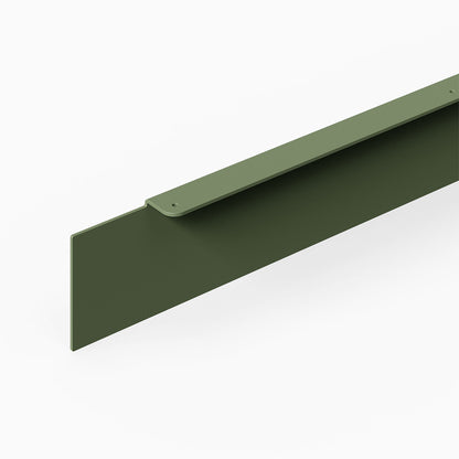 Well Well Toe Kick green metal panel with raised mounting flange for minimalist wall organization and functional storage
