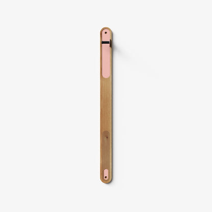 Wallride Vertical Bike Hanger System product image. top portion of product only, against white background. White oak hardwood finish with pink flash
 powder color hardware.