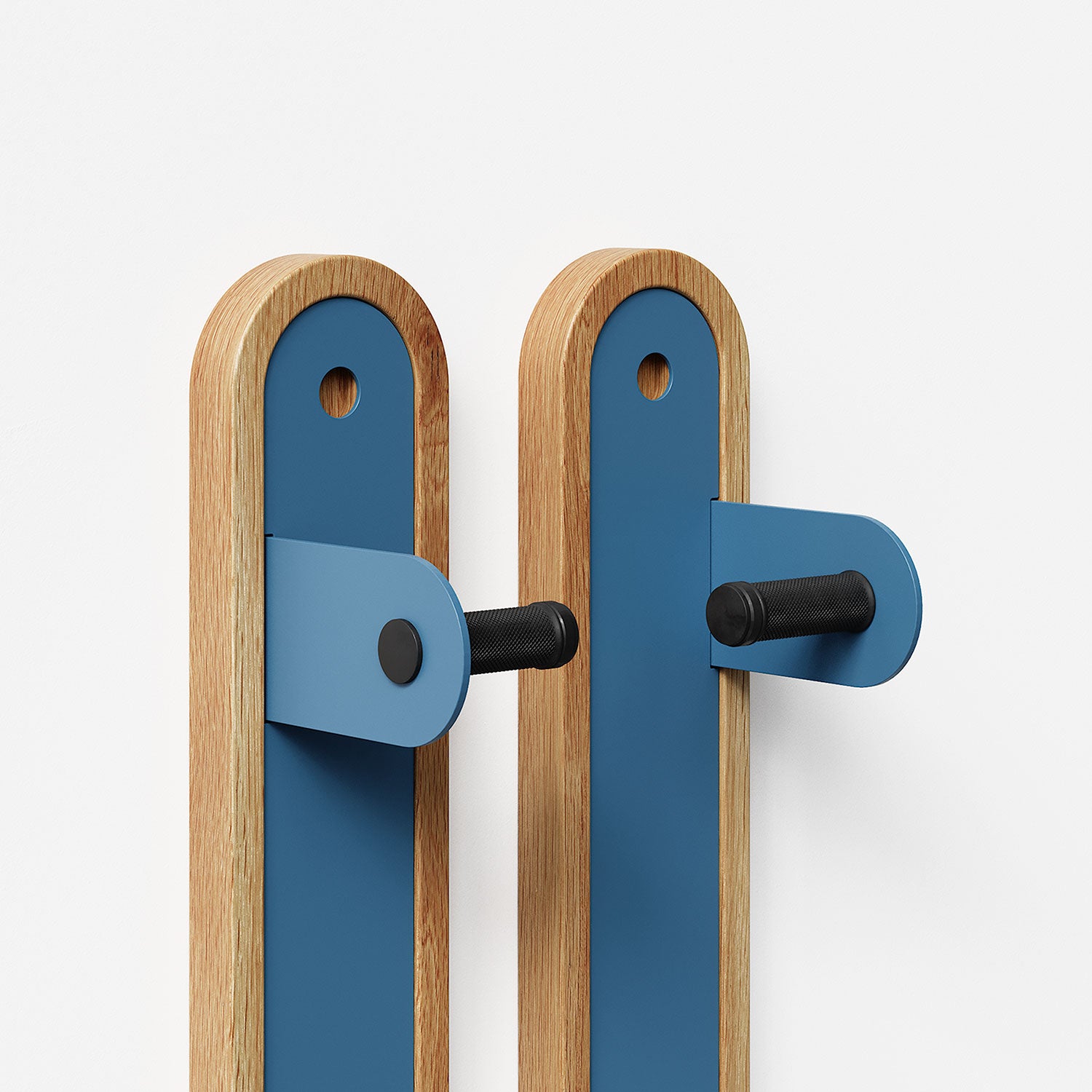 Wallride Vertical Bike Hanger System product image against white background. Upper sections of two hangers shown side by side in white oak and shelf geek blue. Right bracket  configuration. 