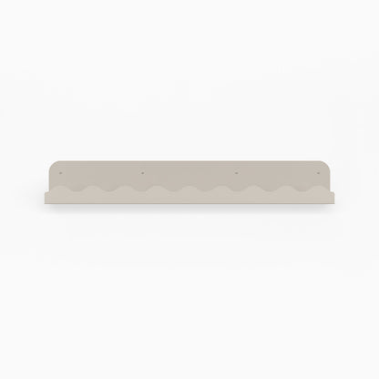 Mini Wave Picture Ledge in concrete steel with streamlined wave pattern for minimalist wall display and functional organization