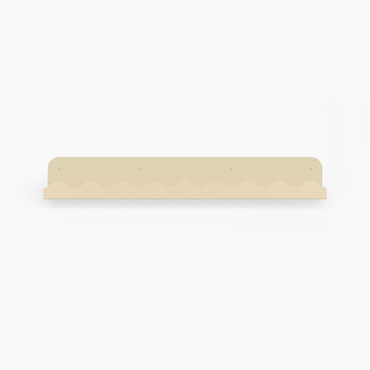 Mini Wave Picture Ledge in dune steel with compact wave pattern for minimalist floating shelf and wall display organization