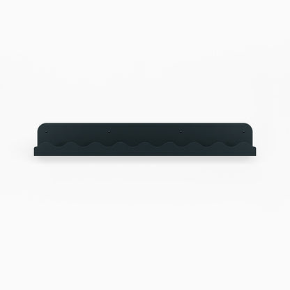 Mini Wave Picture Ledge in dark steel with subtle wave pattern for modern floating shelf and wall display organization