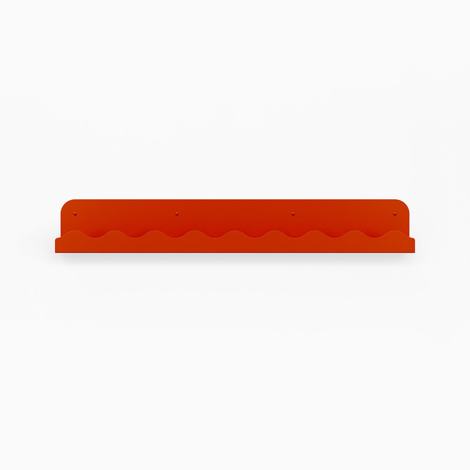 Mini Wave Picture Ledge in vibrant orange steel with distinctive wave pattern for modern wall shelf display and organization solutions