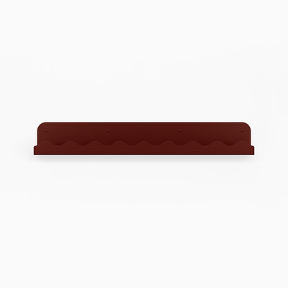 Mini Wave Picture Ledge in deep red steel with subtle wave design for functional floating shelf and wall display organization