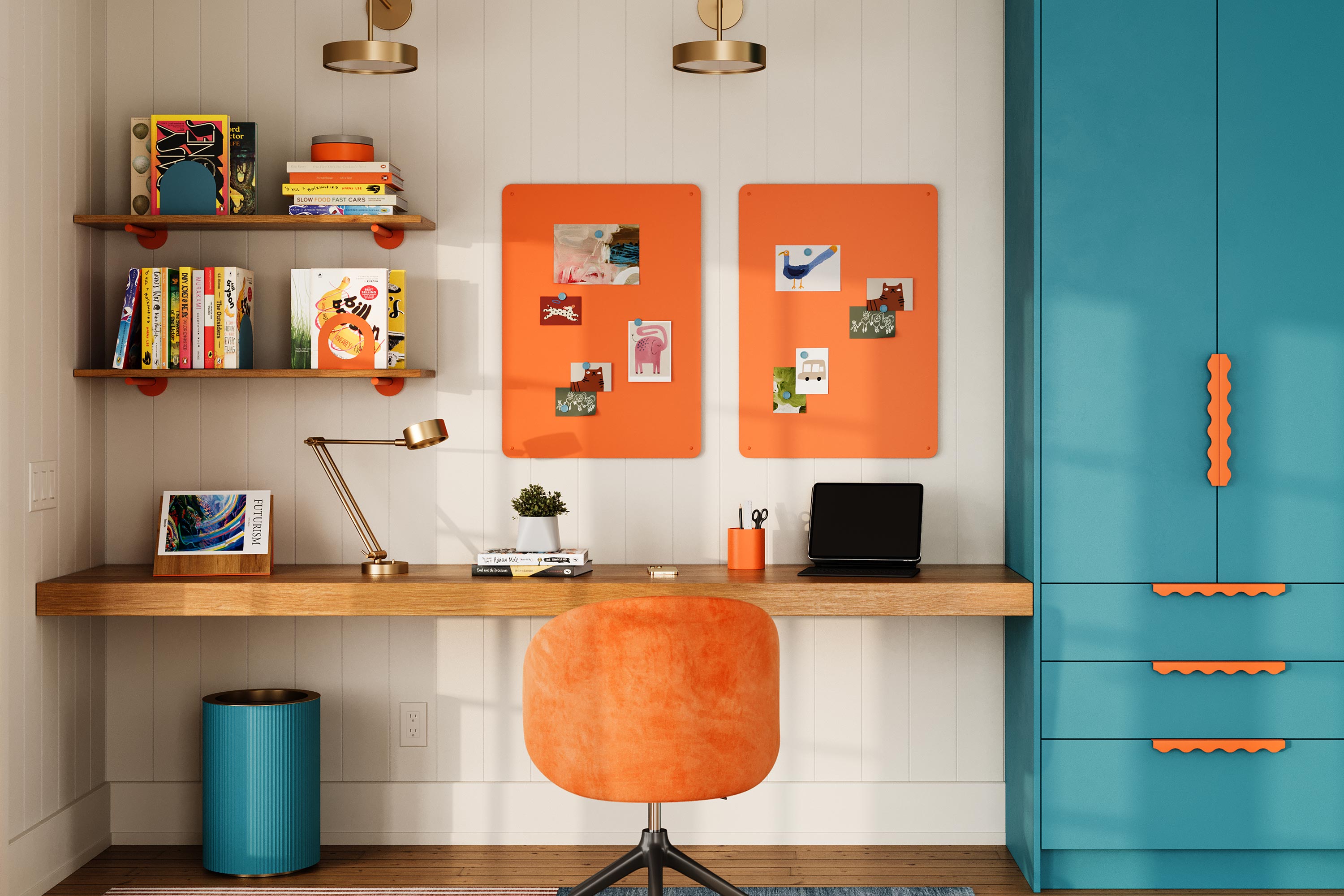 Modern home workspace with bright orange Mosey magnet boards, floating wood desk, and colorful shelving styled with books and art in a playroom-inspired design